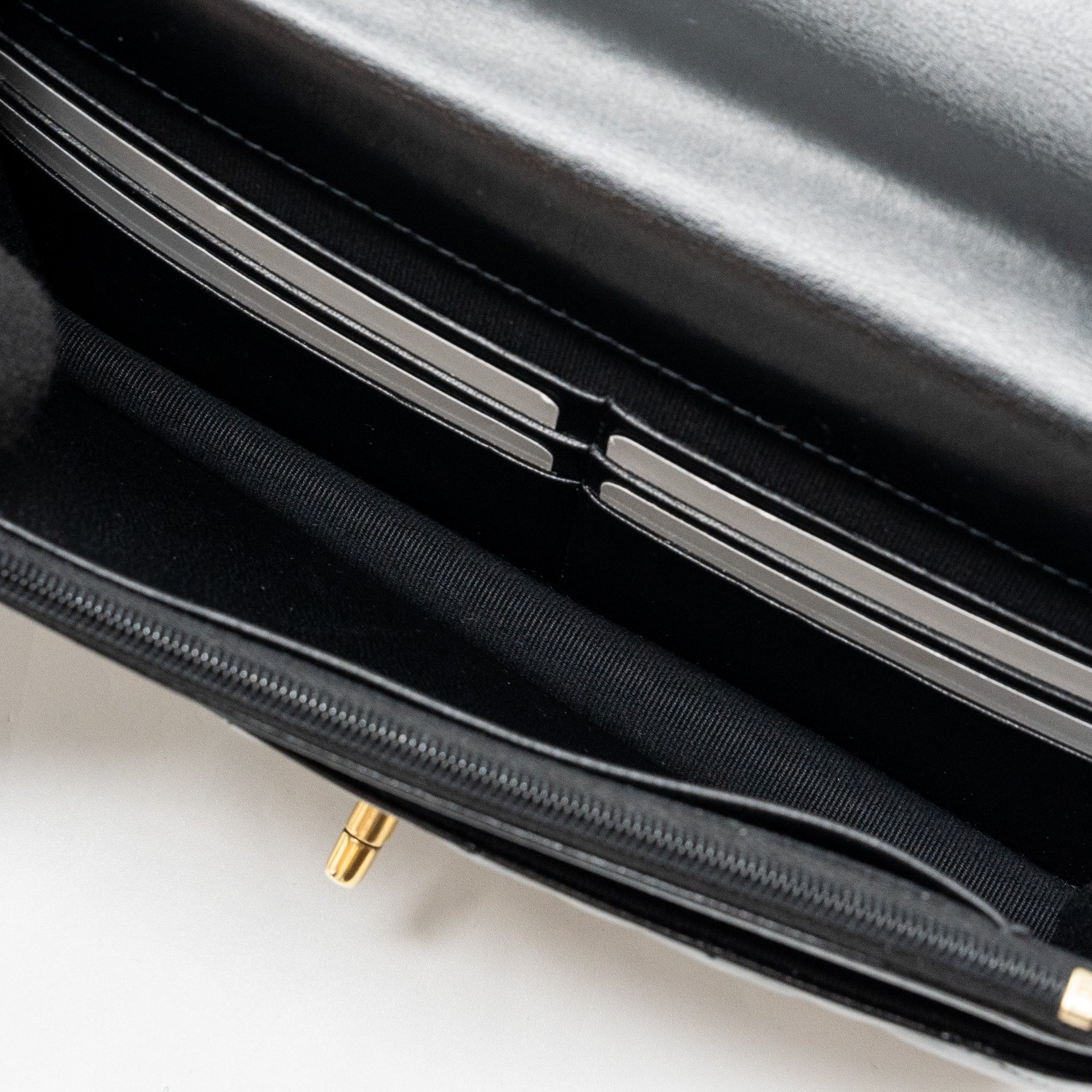 chanel-letter-logo-top-handle-flap-wallet-with-chain-shiny-calfskin-black-ghw-microchip