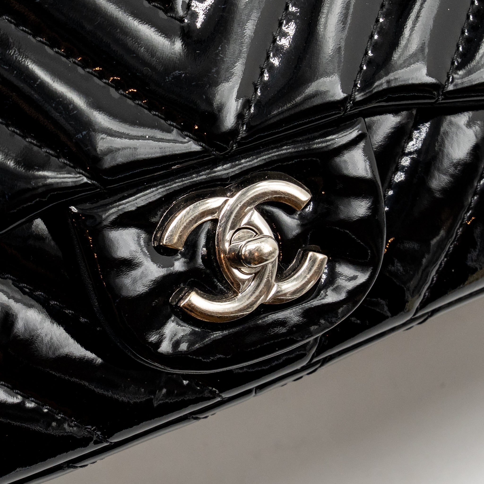 chanel-chevron-jumbo-single-flap-bag-patent-black-shw