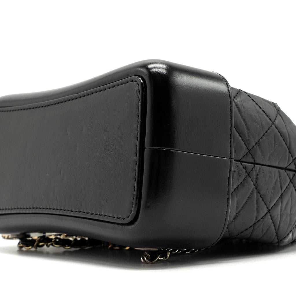 chanel-small-gabrielle-backpack-aged-calfskin-black-multicolour-hardwaremicrochip