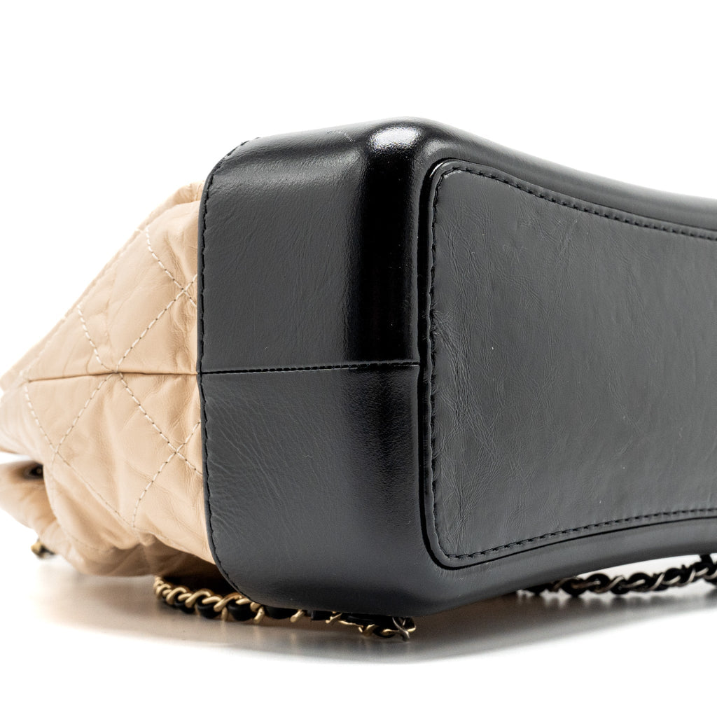 chanel-medium-gabrielle-backpack-aged-calfskin-beige-black-multicolour-hardware