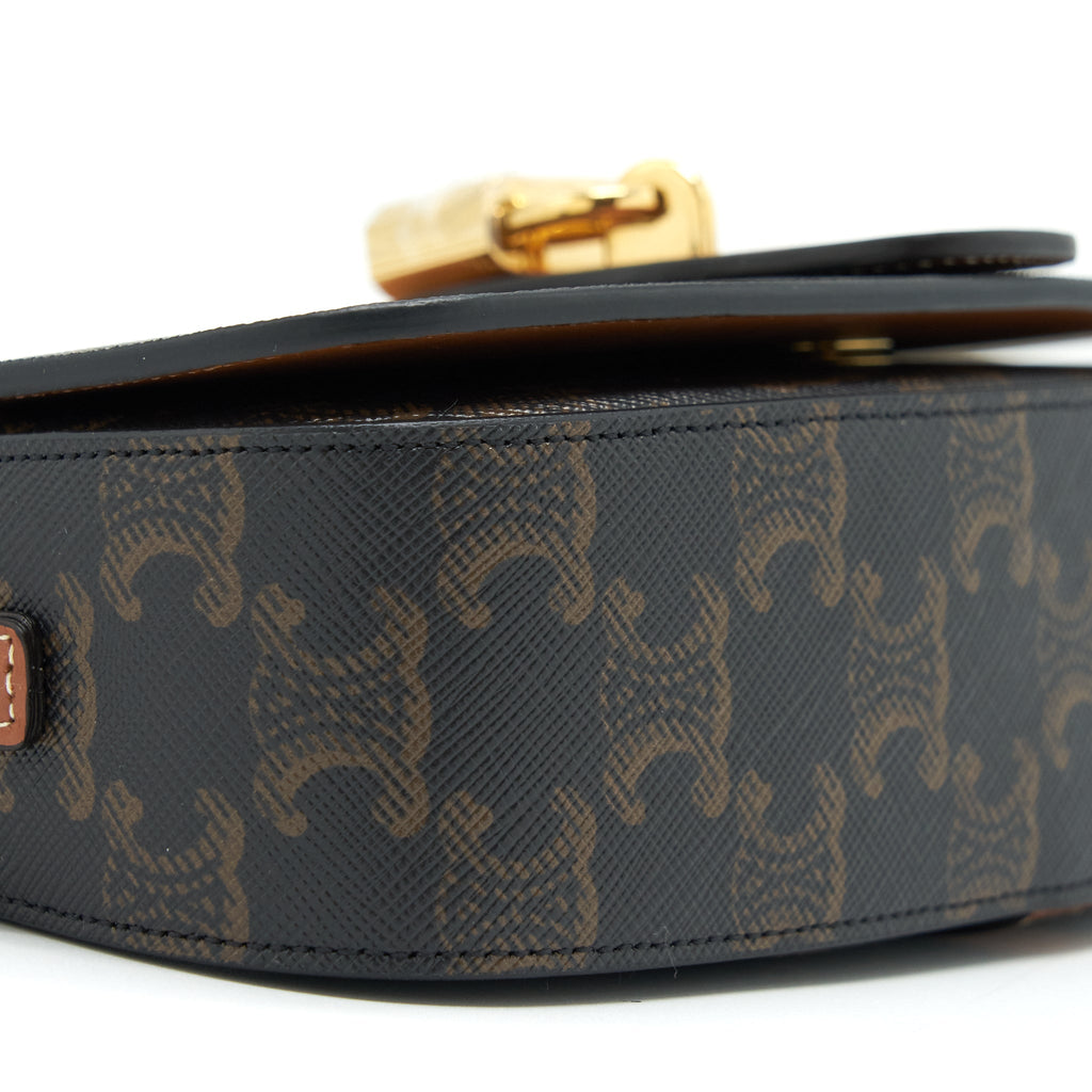 celine-clutch-on-strap-in-triumphed-canvas-calfskin-tan-ghw