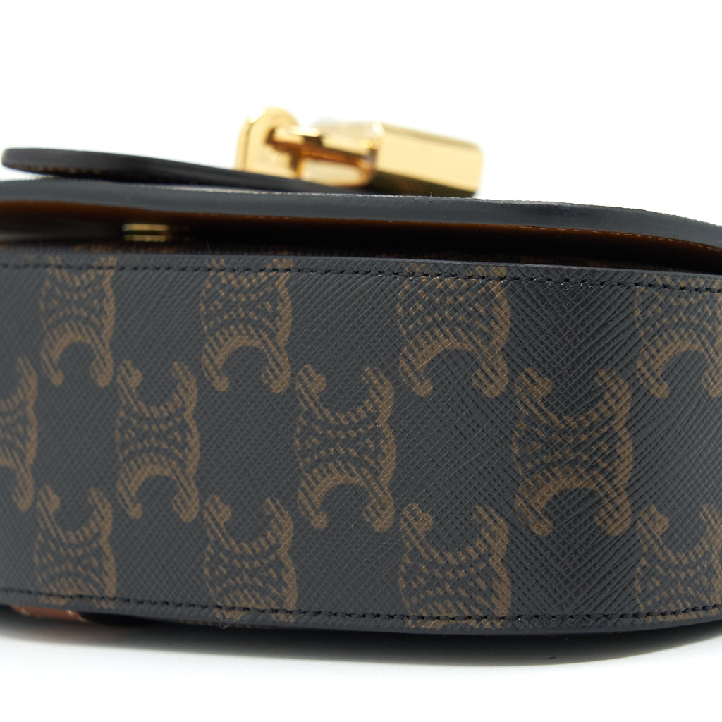 celine-clutch-on-strap-in-triumphed-canvas-calfskin-tan-ghw
