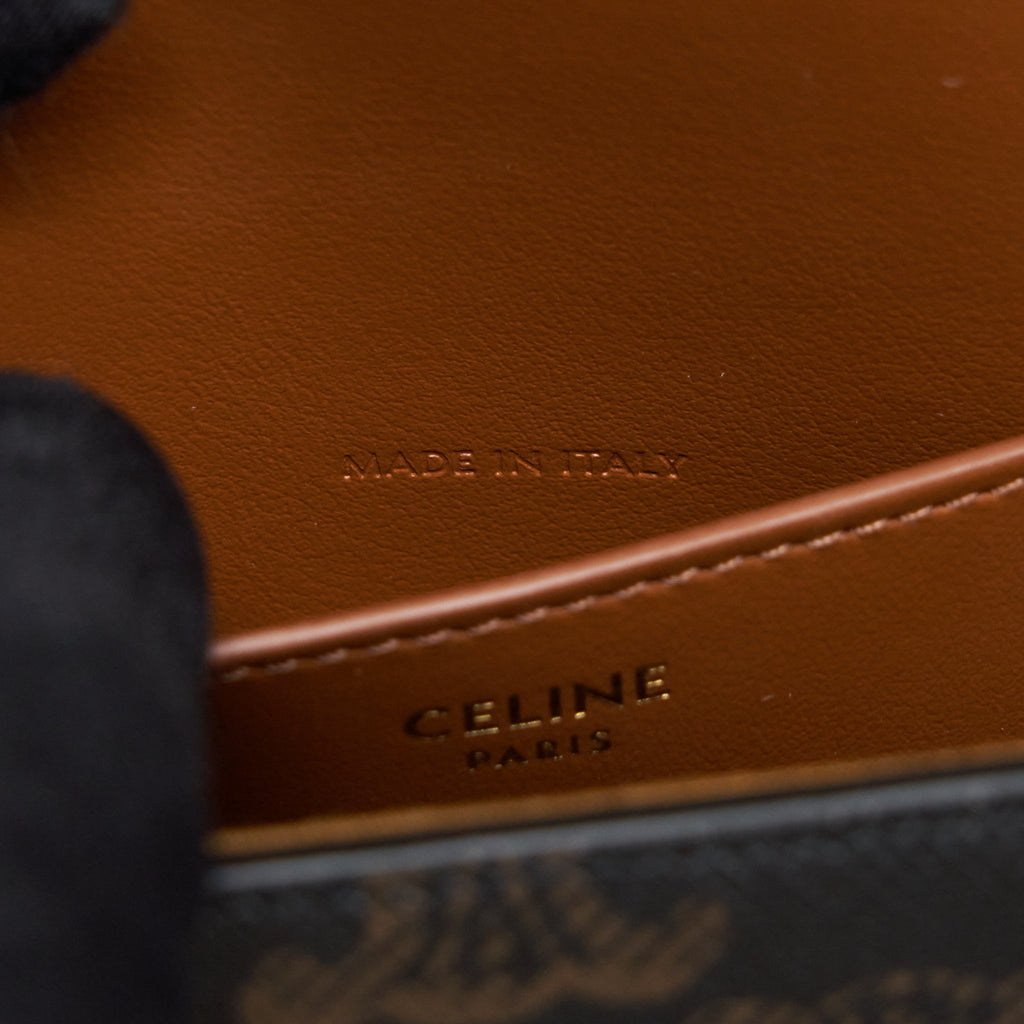 celine-clutch-on-strap-in-triumphed-canvas-calfskin-tan-ghw