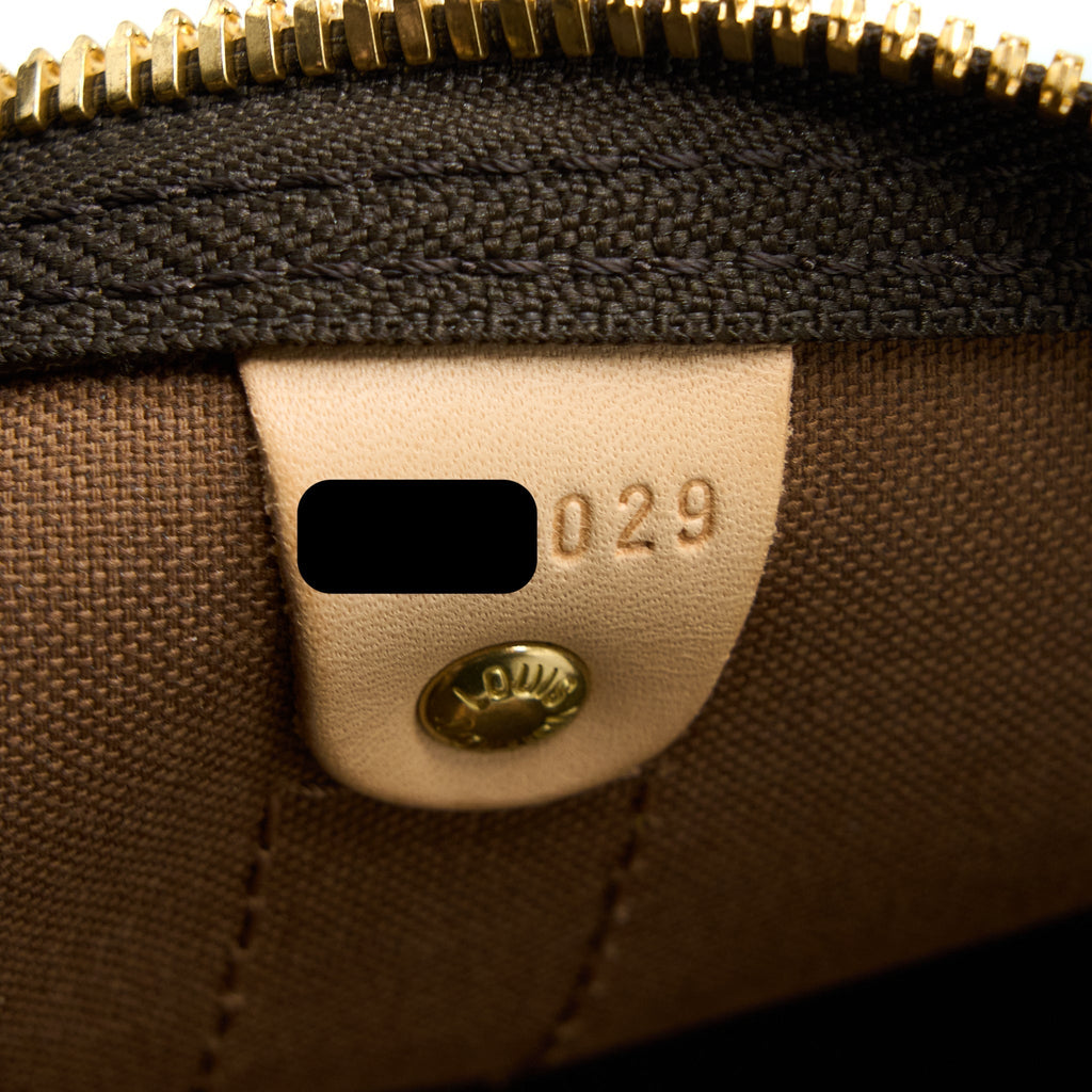 louis-vuitton-keepall-bandouliere-50-monogram-canvas-ghw