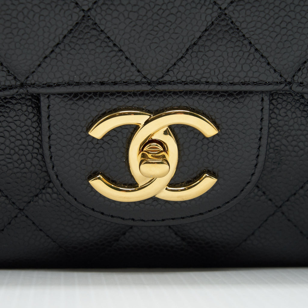 chanel-maxi-classic-double-flap-caviar-black-ghw-serial-21