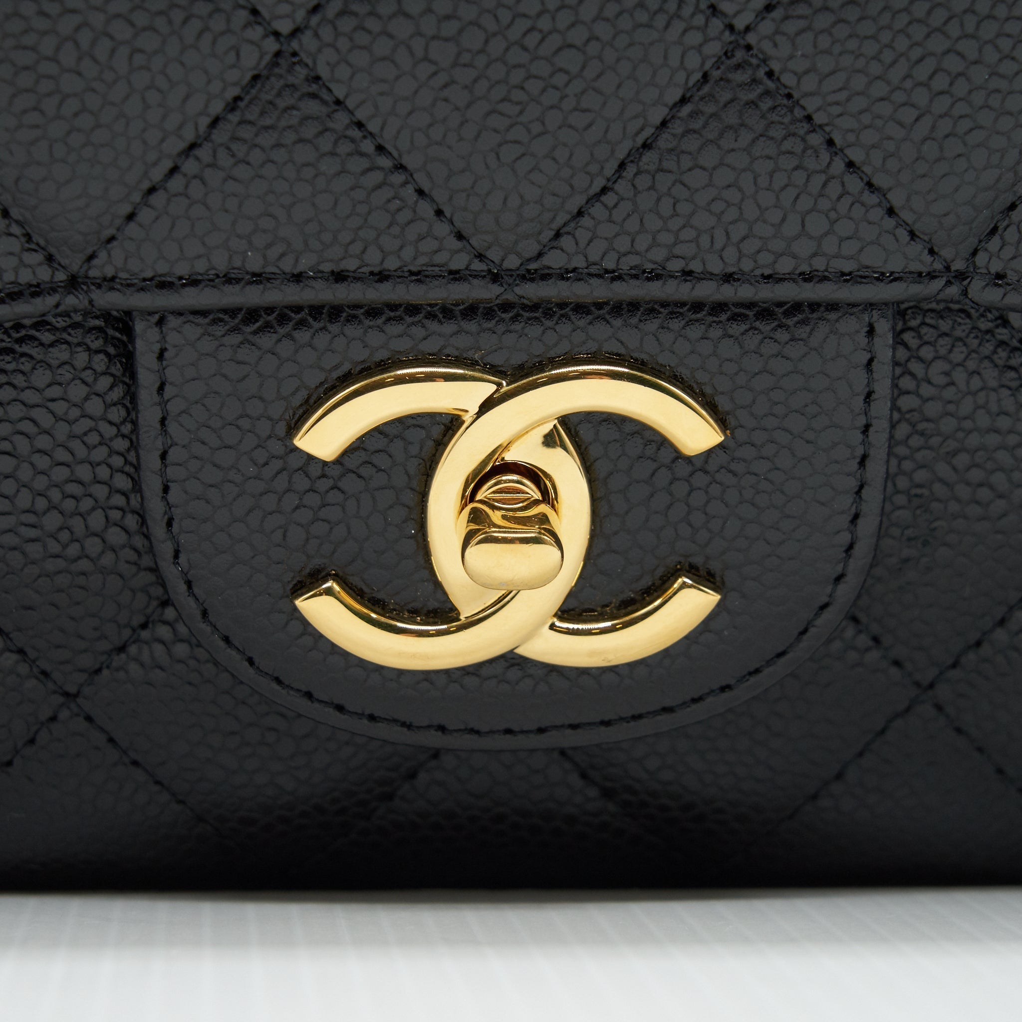 chanel-maxi-classic-double-flap-caviar-black-ghw-serial-21