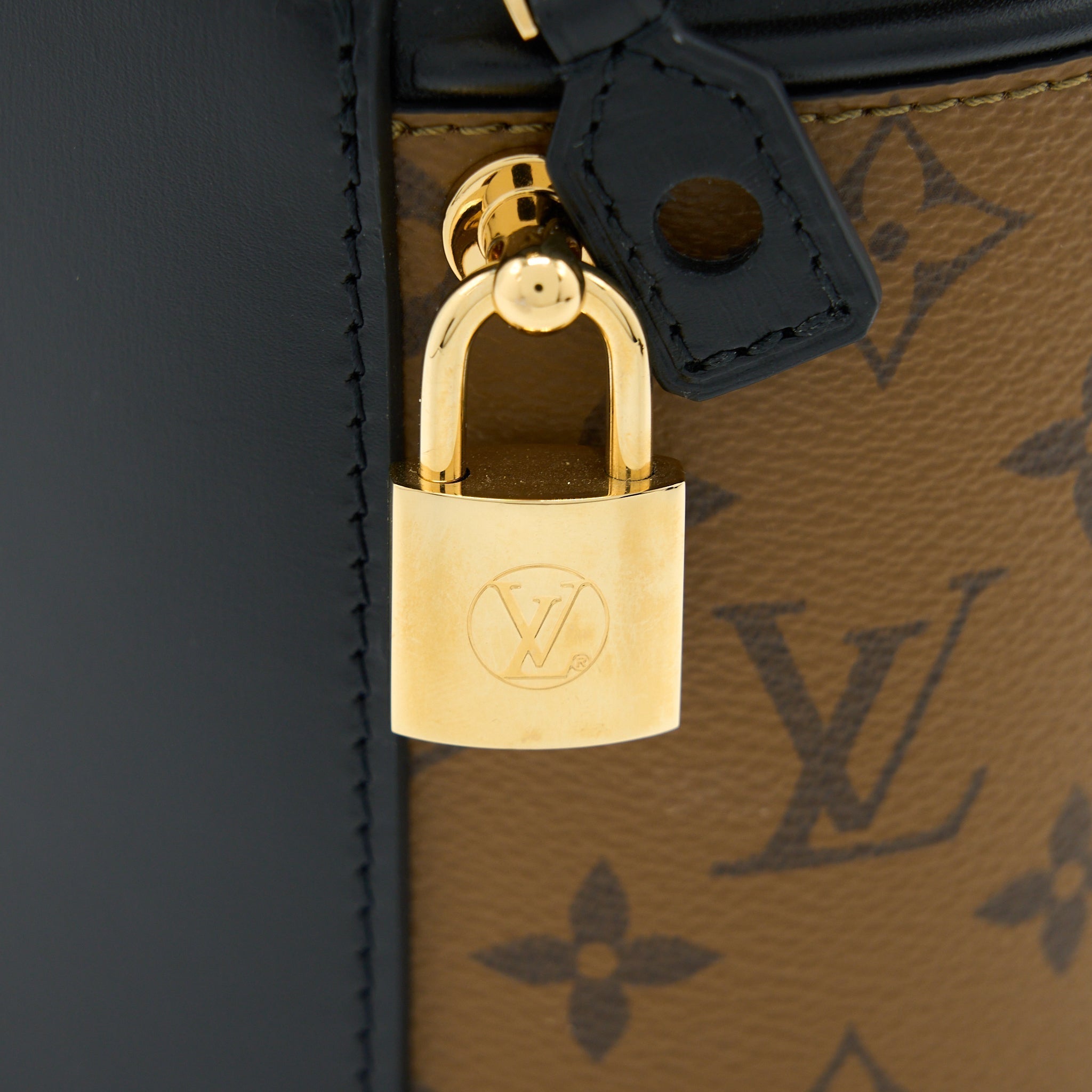 louis-vuitton-cannes-monagram-reverse-canvas-ghw