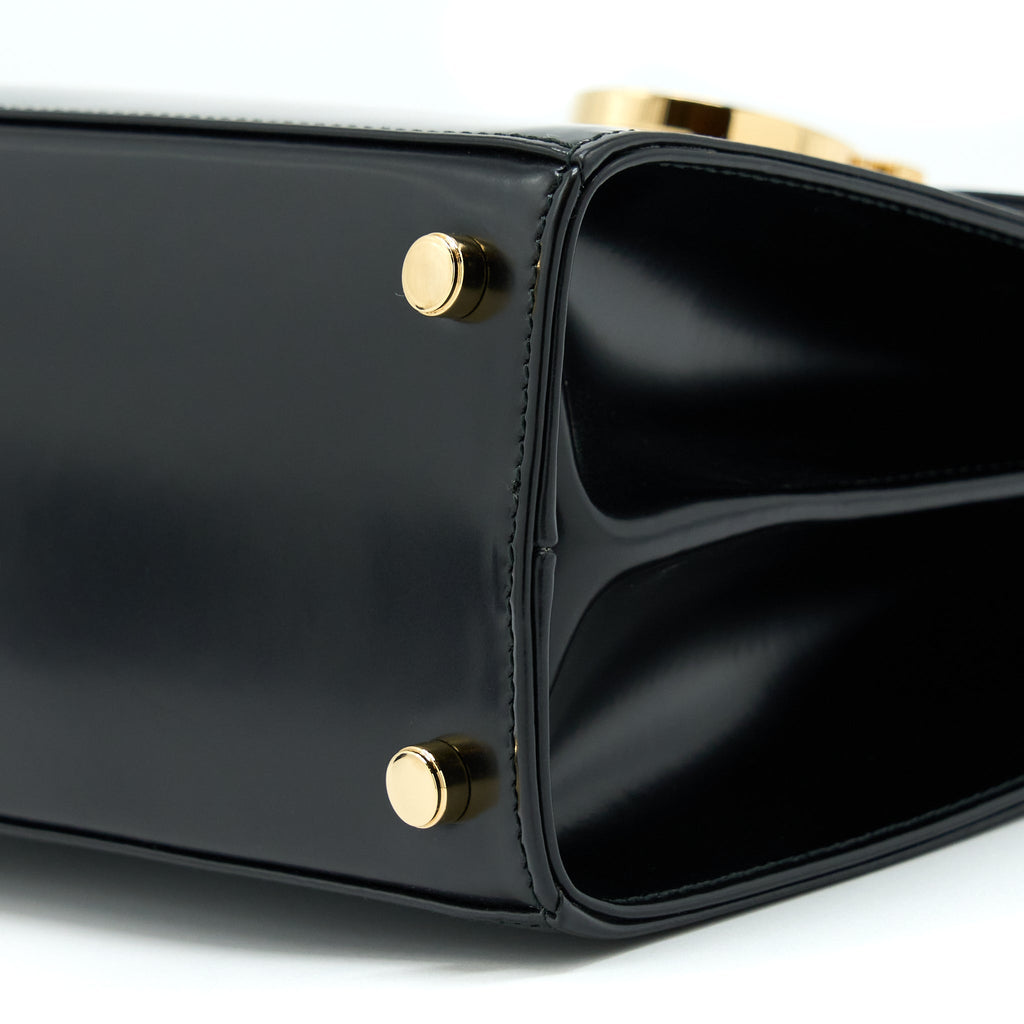 salvatore-ferragamo-gancini-top-handle-bag-calfskin-black-ghw