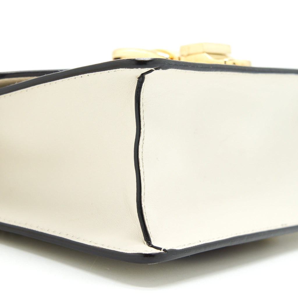 gucci-sylvie-mini-leather-chain-bag-in-white-ghw