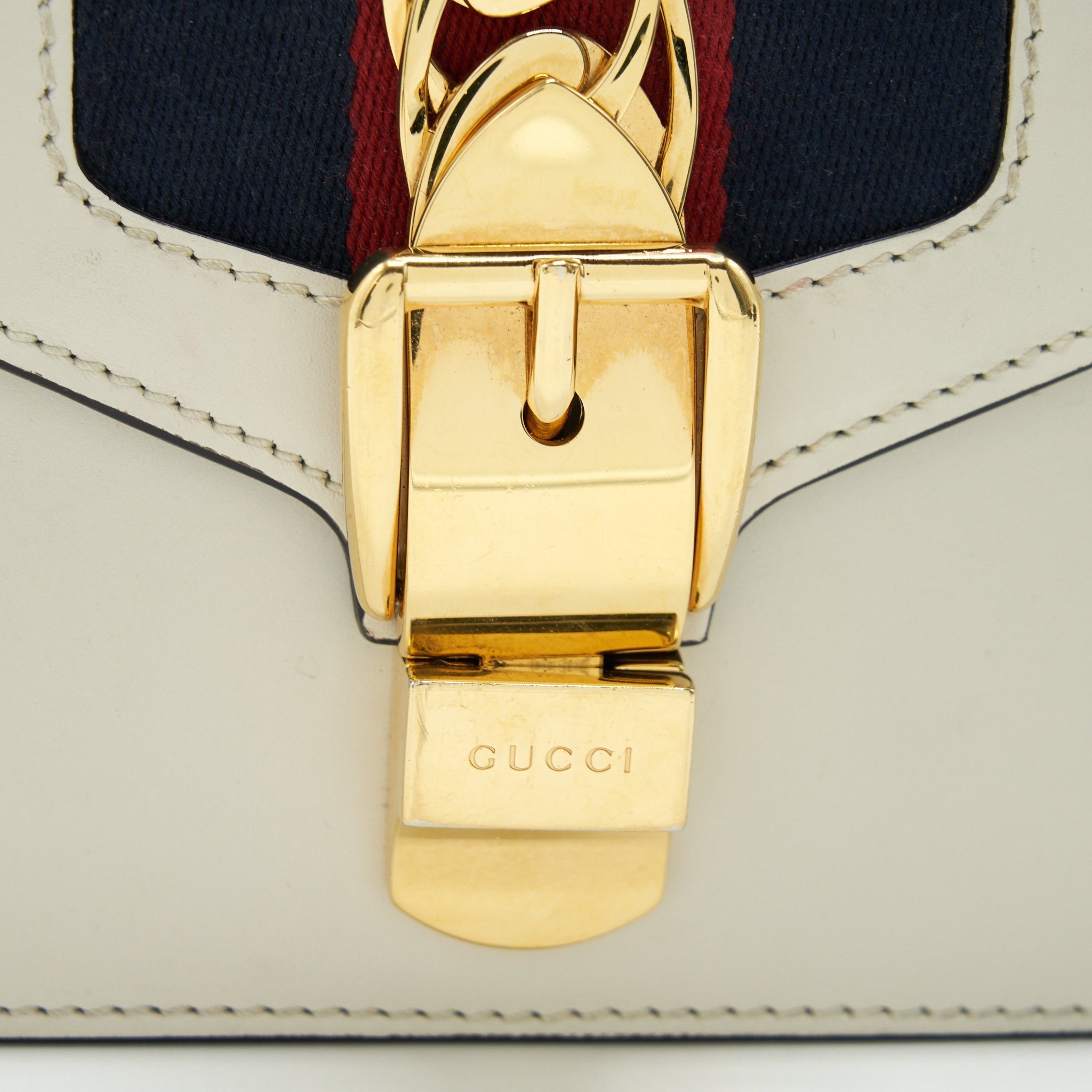 gucci-sylvie-mini-leather-chain-bag-in-white-ghw