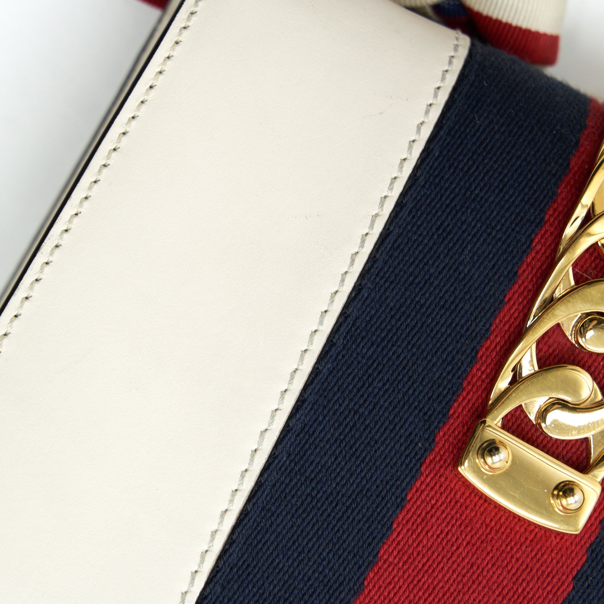 gucci-sylvie-mini-leather-chain-bag-in-white-ghw