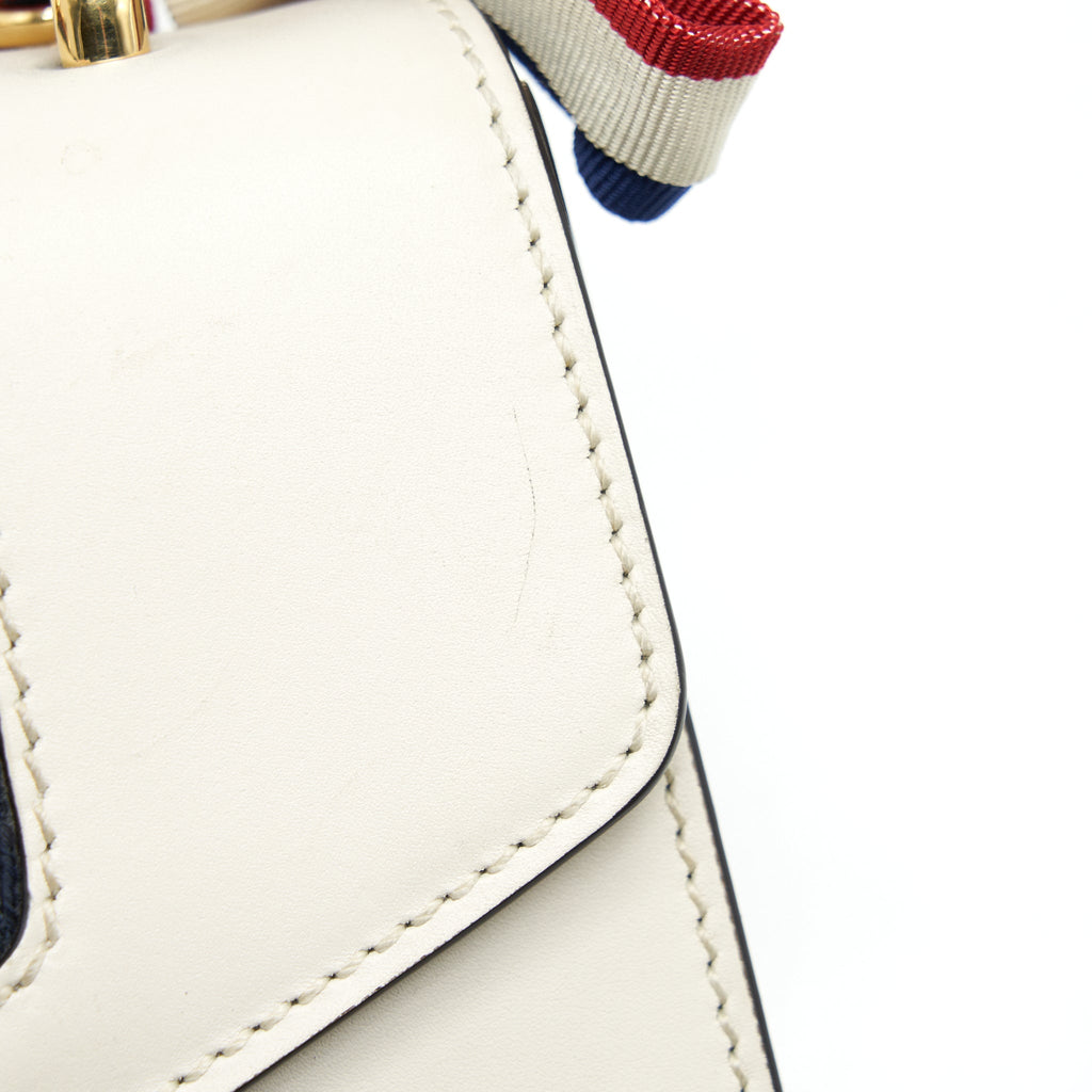 gucci-sylvie-mini-leather-chain-bag-in-white-ghw