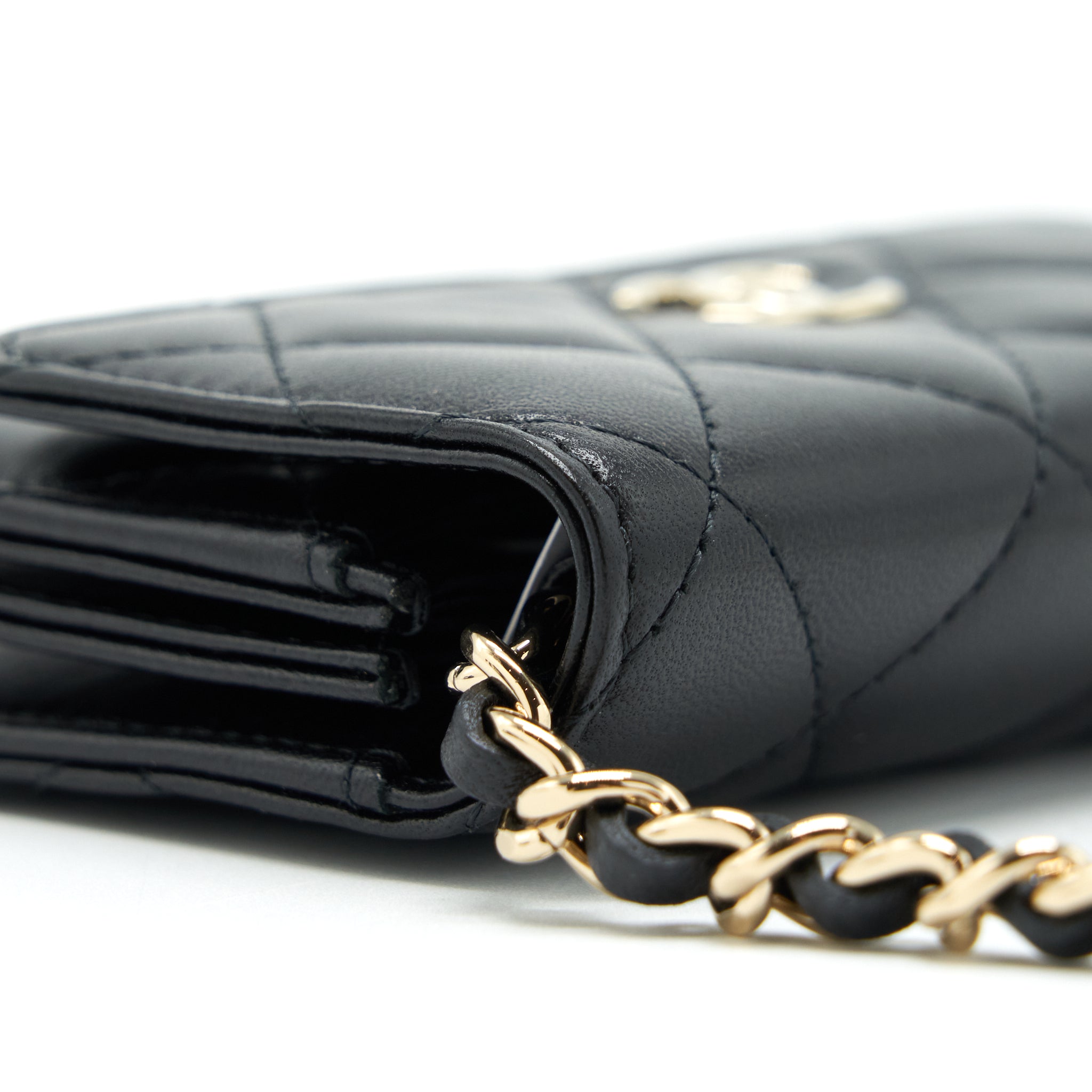 chanel-mini-flap-bag-with-camellia-chain-lambskin-black-lghw