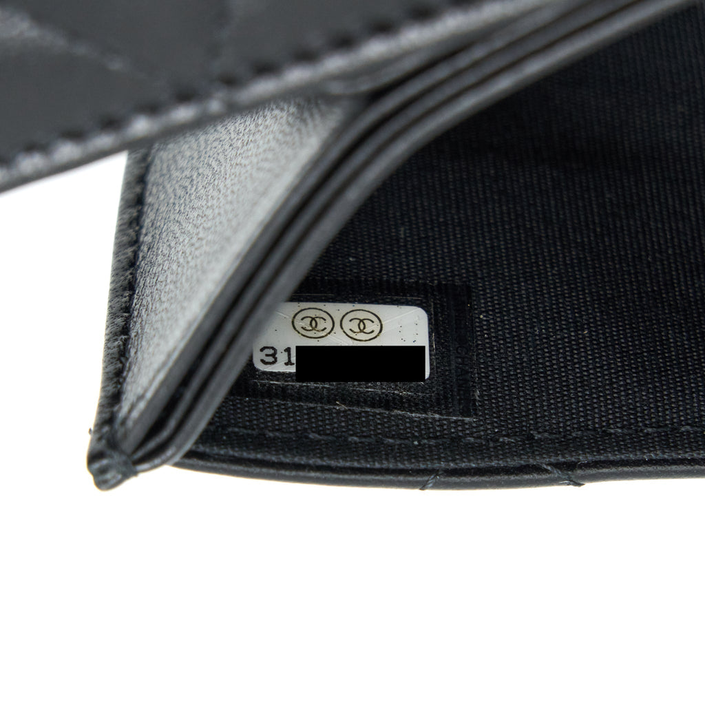 chanel-mini-flap-bag-with-camellia-chain-lambskin-black-lghw