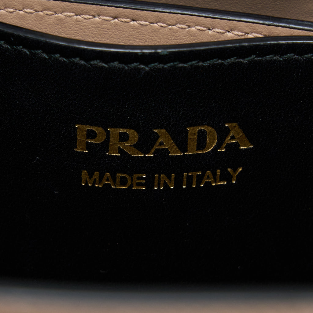 prada-saffiano-panier-bag-cipria-nero-ghw