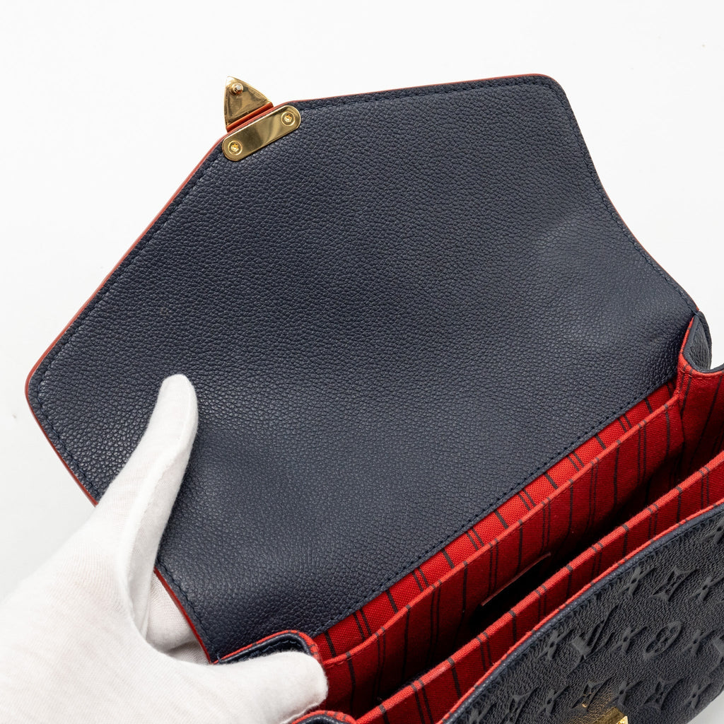 louis-vuitton-pochette-metis-monogram-empreinte-marine-rouge-ghw-copy