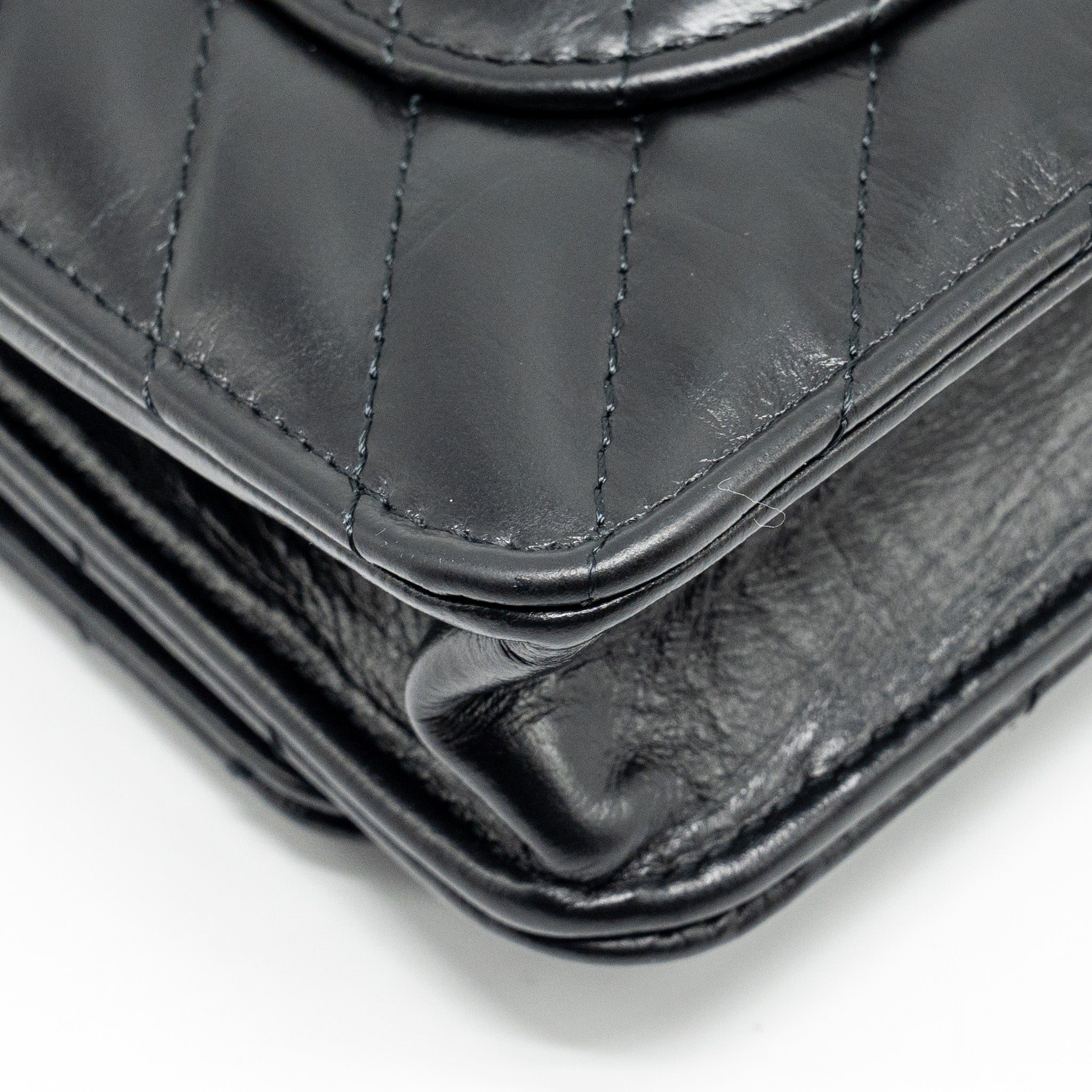 chanel-chevron-2-55-reissue-wallet-on-chain-aged-calfskin-black-ghw-microchip
