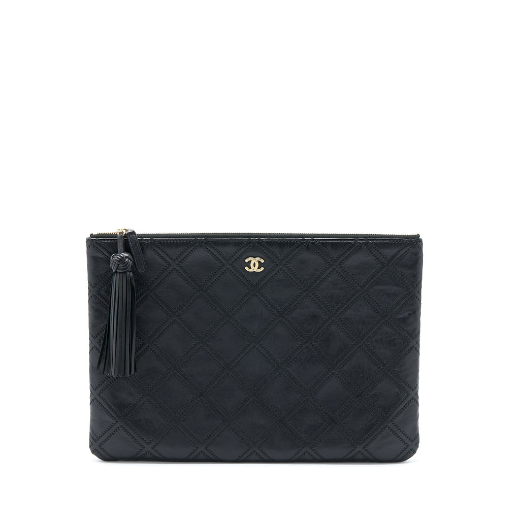chanel-quilted-pouch-with-tassel-black-lghw