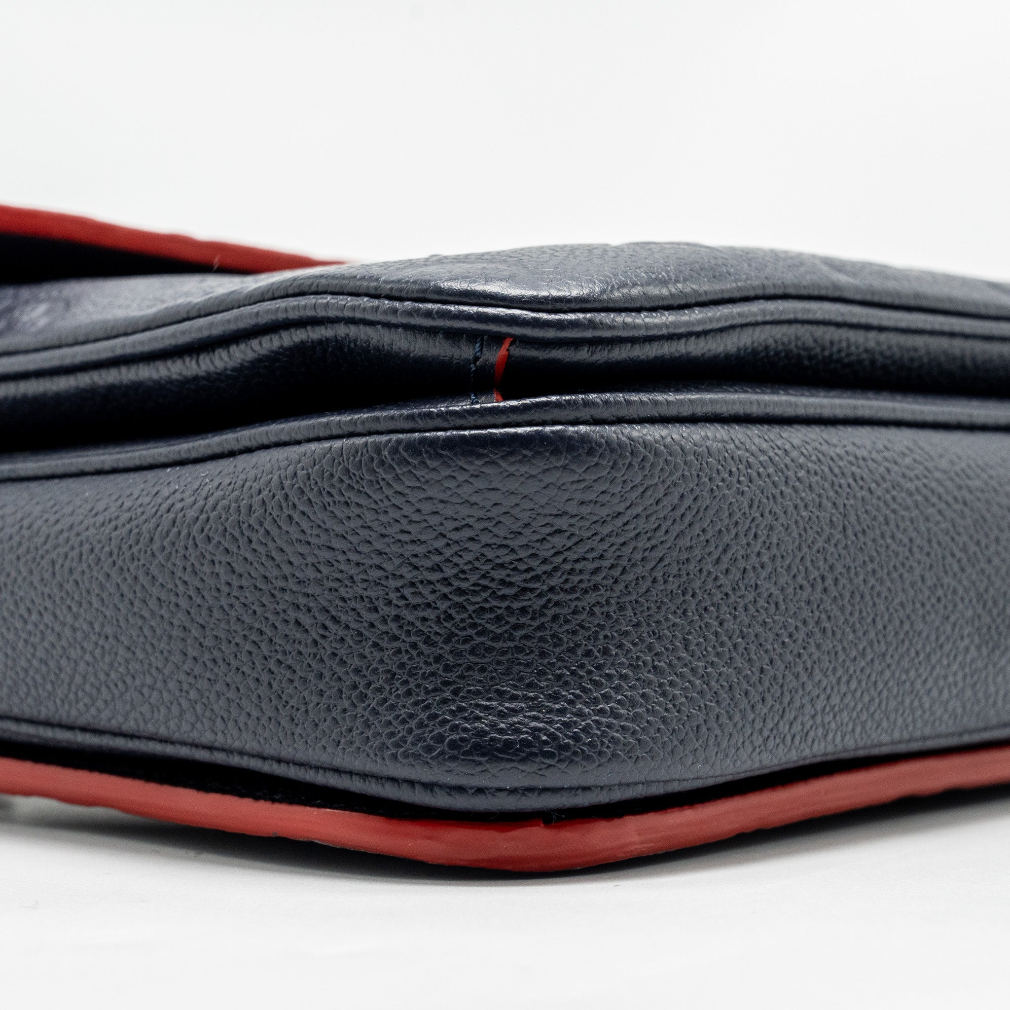 louis-vuitton-pochette-metis-monogram-empreinete-leather-navy-ghw