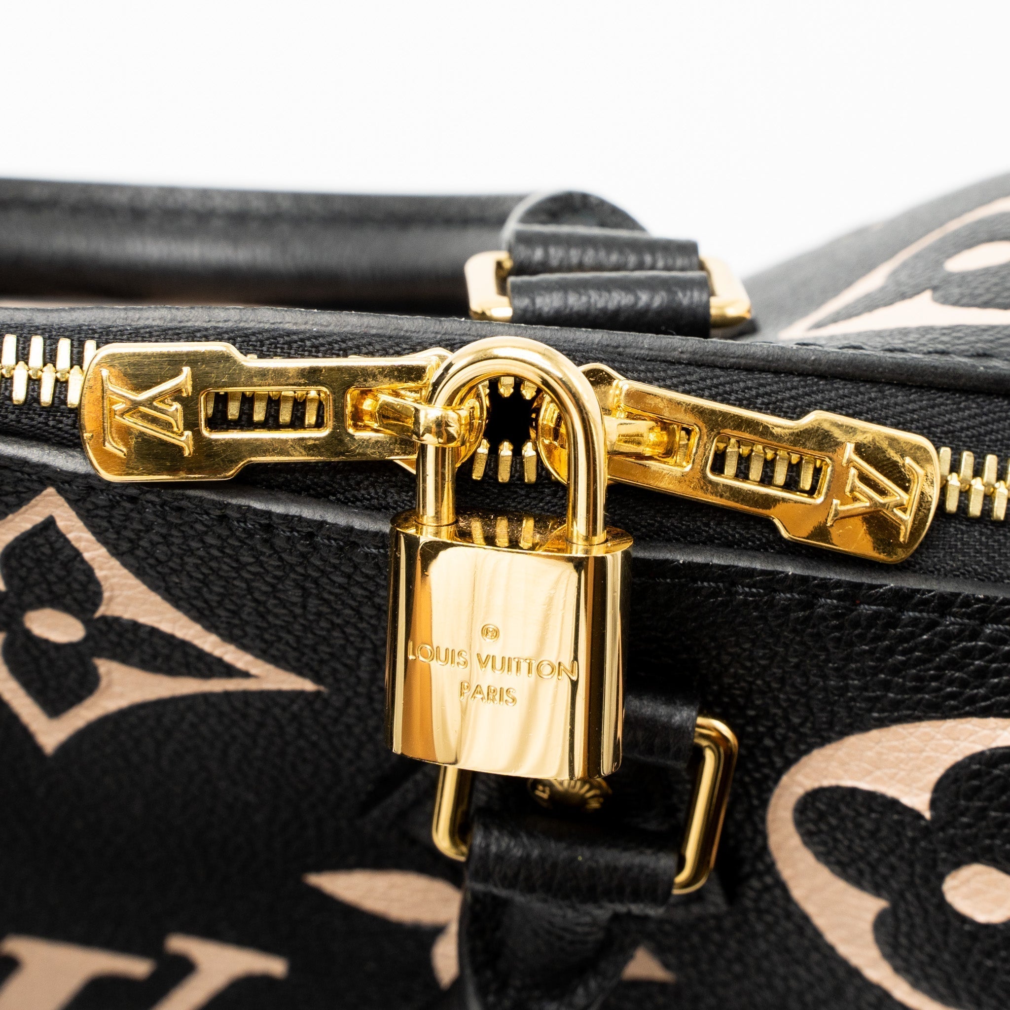 louis-vuitton-speedy-bandouliere-25-bicolour-monogram-empreinte-ghw-new-version
