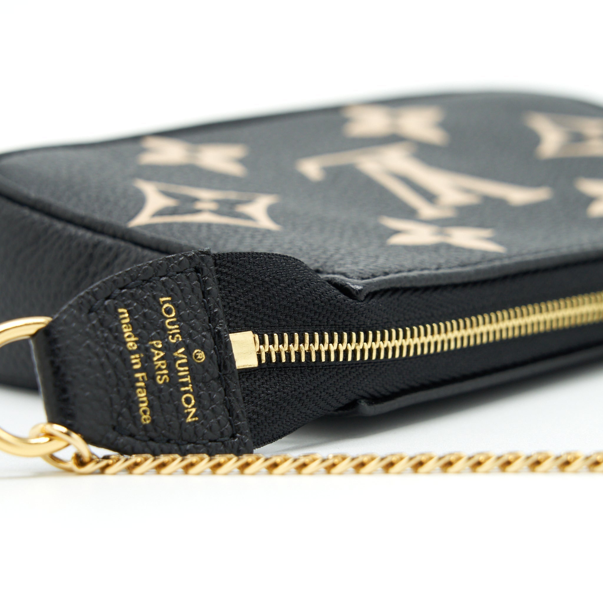 louis-vuitton-mini-pochette-accessories-bicolour-monogram-em-reintegration-black