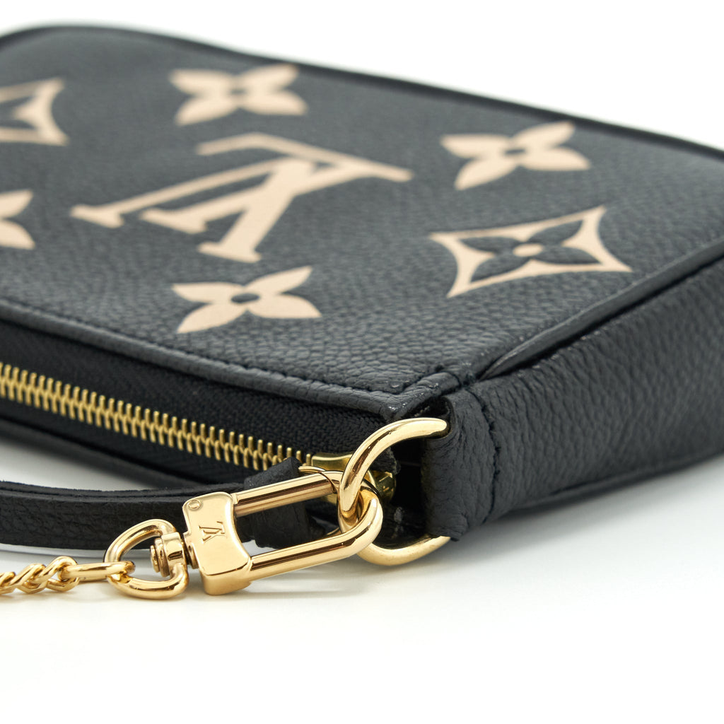 louis-vuitton-mini-pochette-accessories-bicolour-monogram-em-reintegration-black