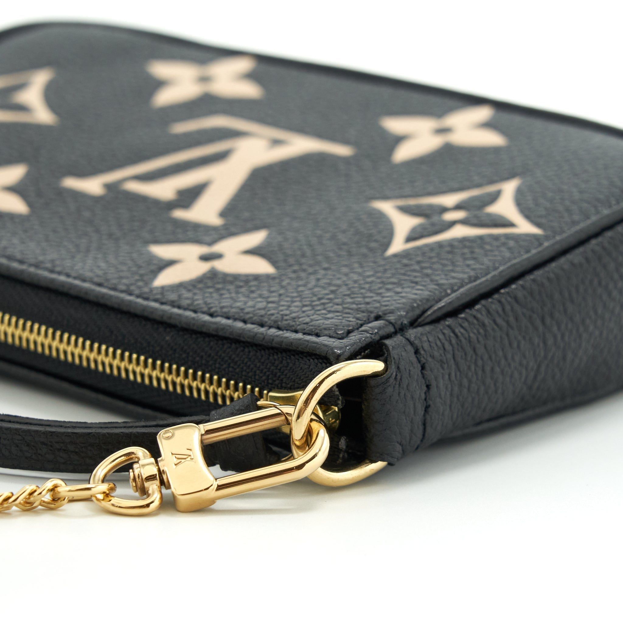 louis-vuitton-mini-pochette-accessories-bicolour-monogram-em-reintegration-black