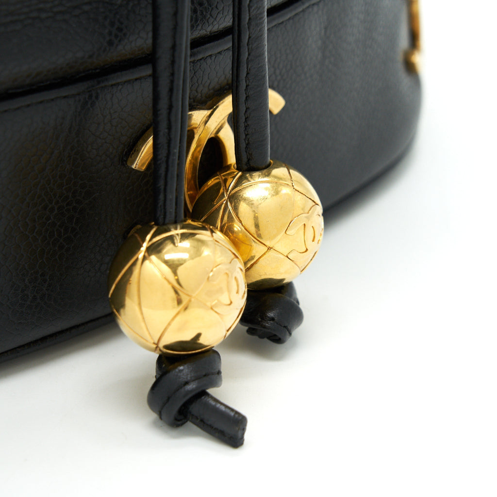 chanel-vintage-cc-logo-pearl-crush-caviar-bucket-bag-black
