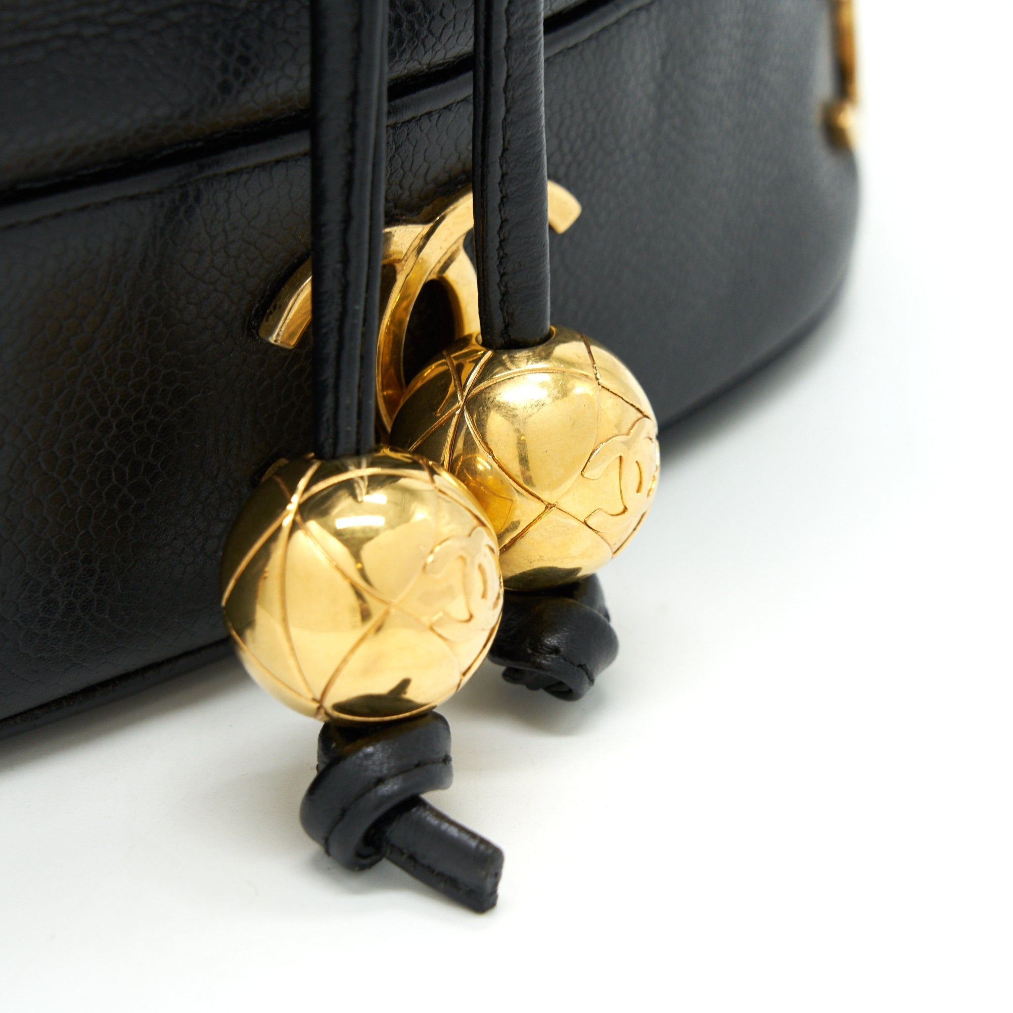 chanel-vintage-cc-logo-pearl-crush-caviar-bucket-bag-black