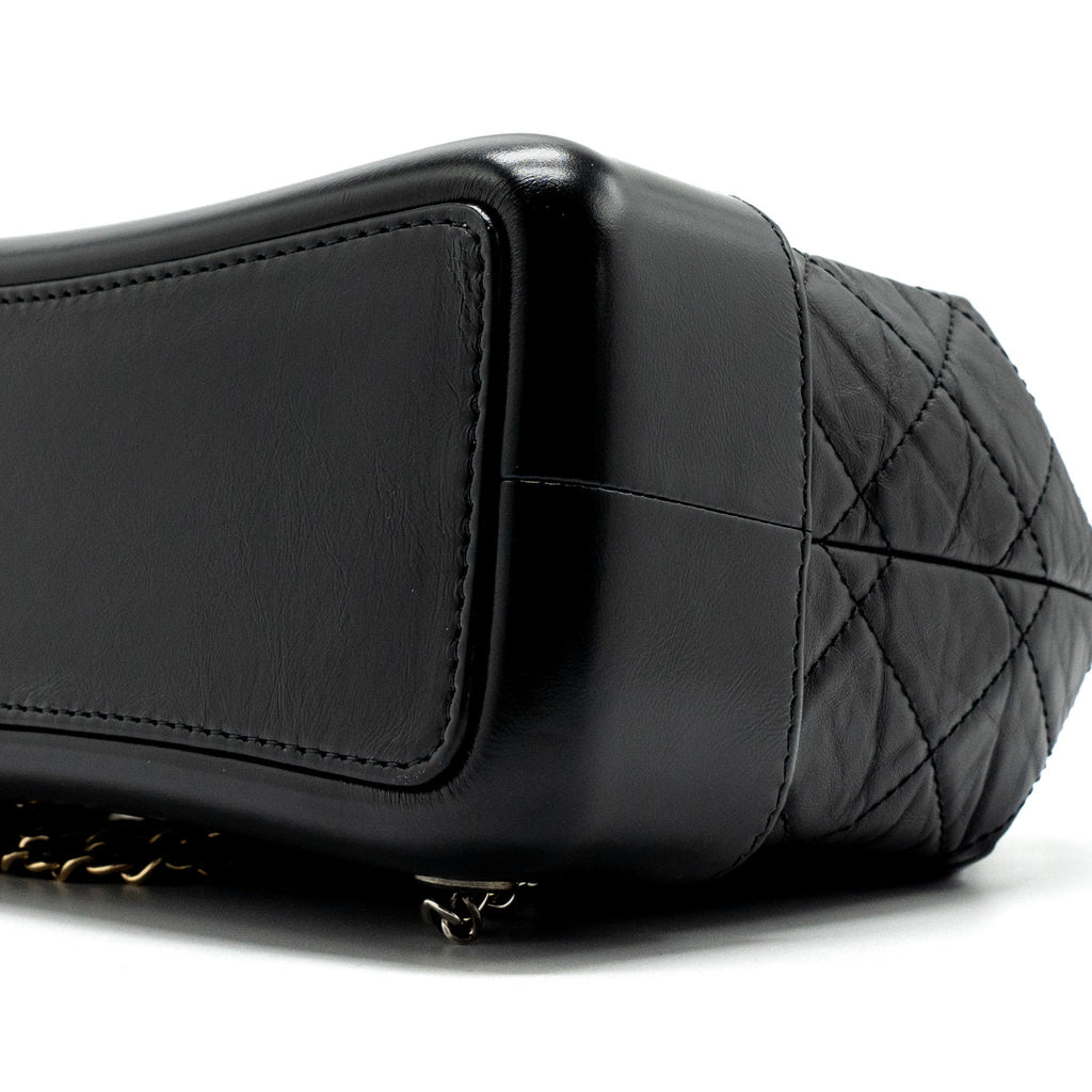 chanel-small-gabrielle-backpack-aged-calfskin-black-multicolour-hardware