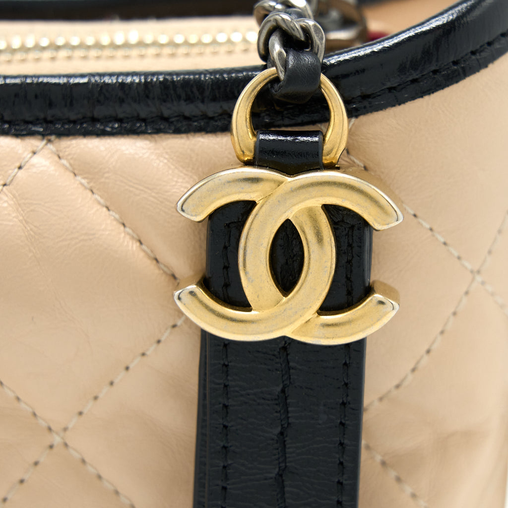 chanel-small-gabrielle-bag-aged-calfskin-beige-black-multicolour-hardware