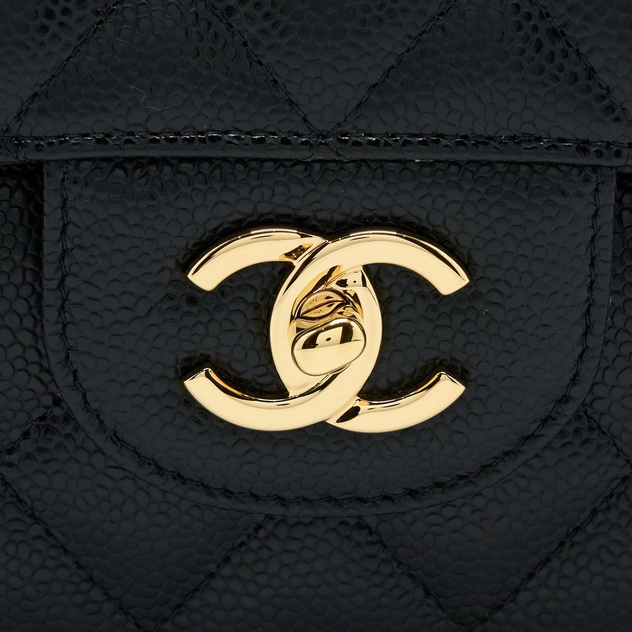chanel-classic-jumbo-double-flap-caviar-black-ghw-microchip
