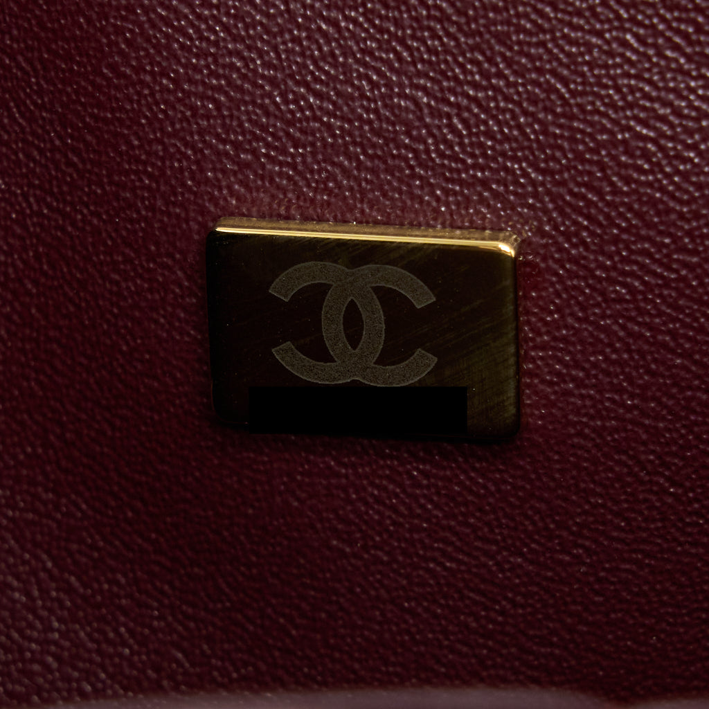 chanel-classic-jumbo-double-flap-caviar-black-ghw-microchip
