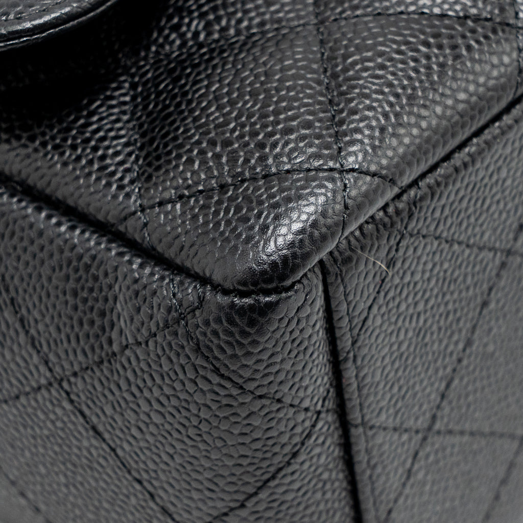 chanel-maxi-classic-double-flap-bag-caviar-black-ghw-1