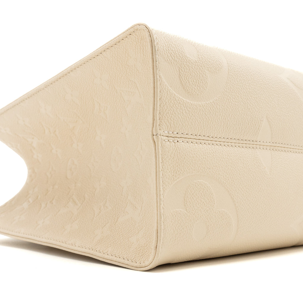 louis-vuitton-onthego-mm-empreinte-leather-white-ghw-new-version