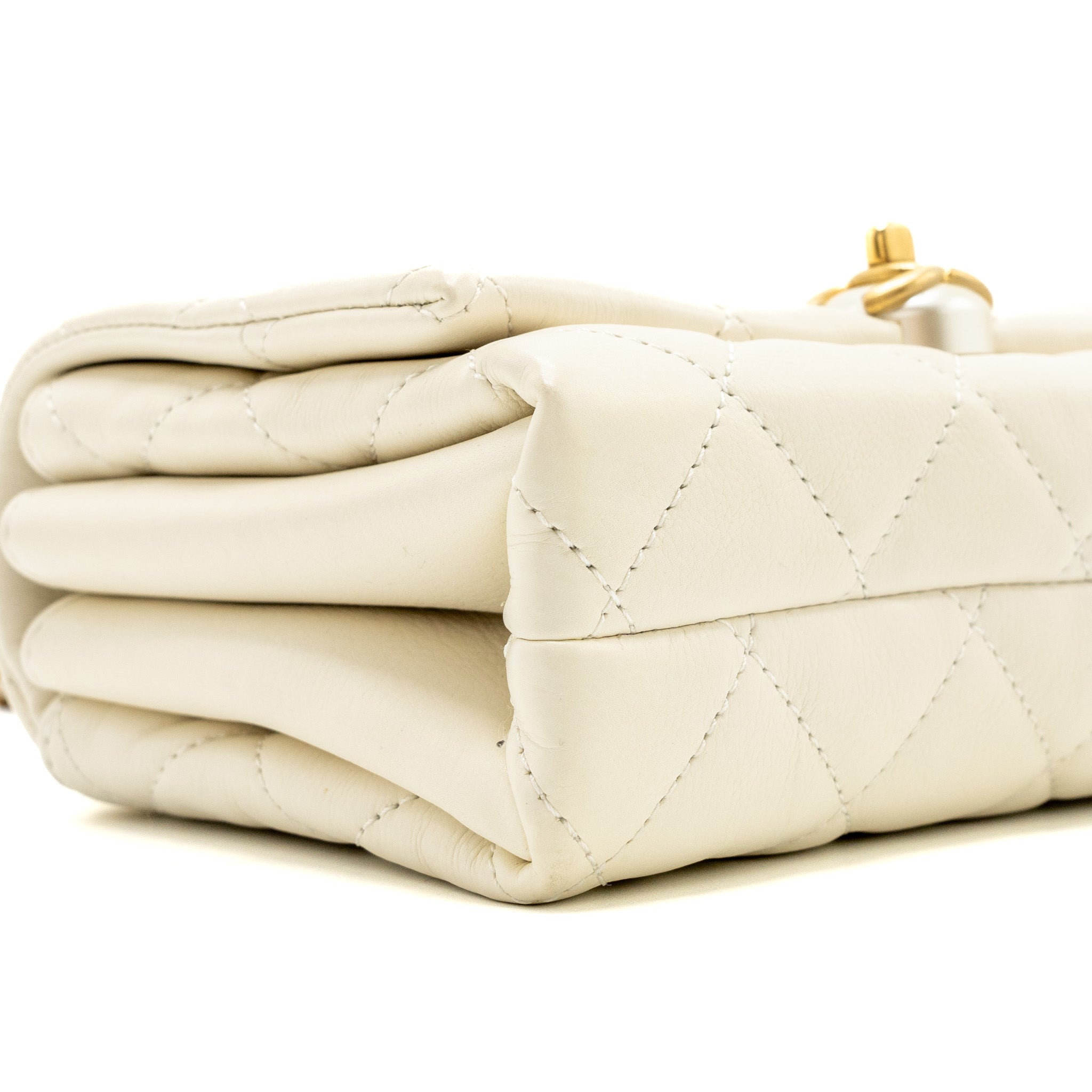 chanel-quilted-mini-flap-bag-lambskin-white-ghw