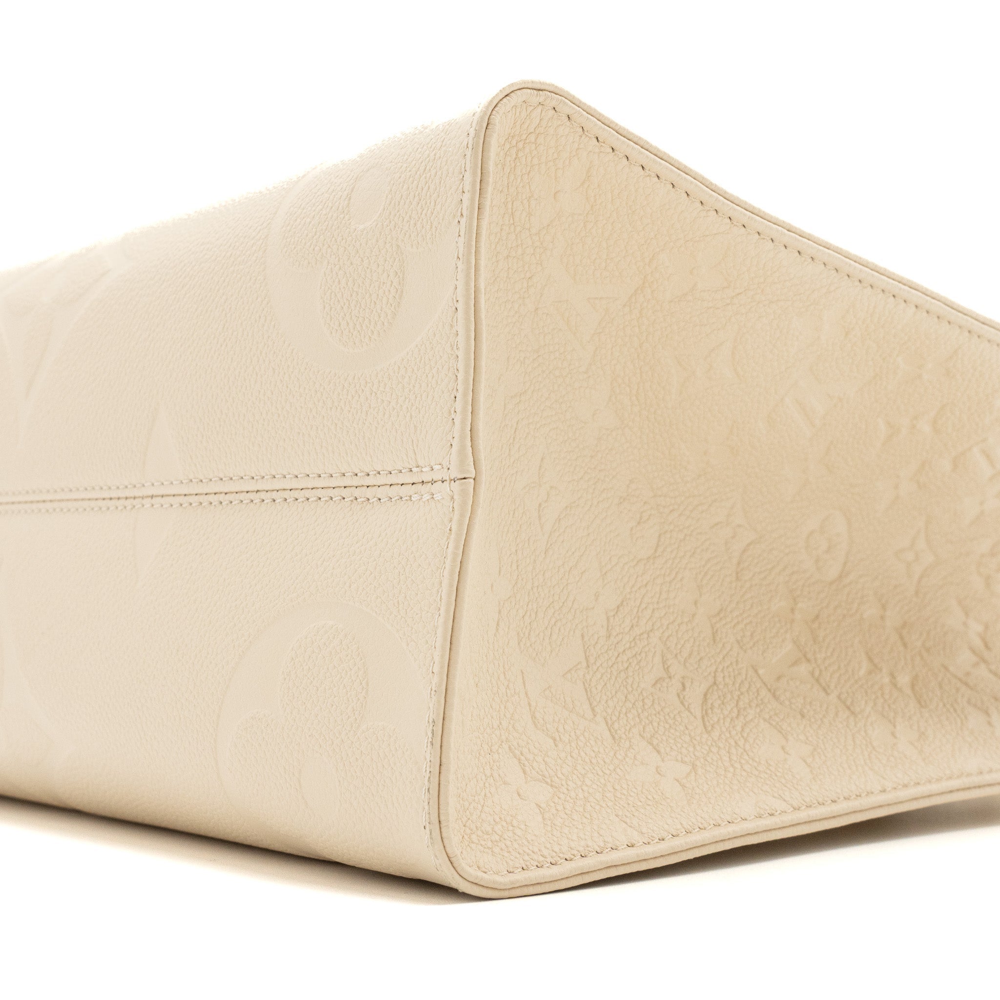 louis-vuitton-onthego-mm-empreinte-leather-white-ghw-new-version