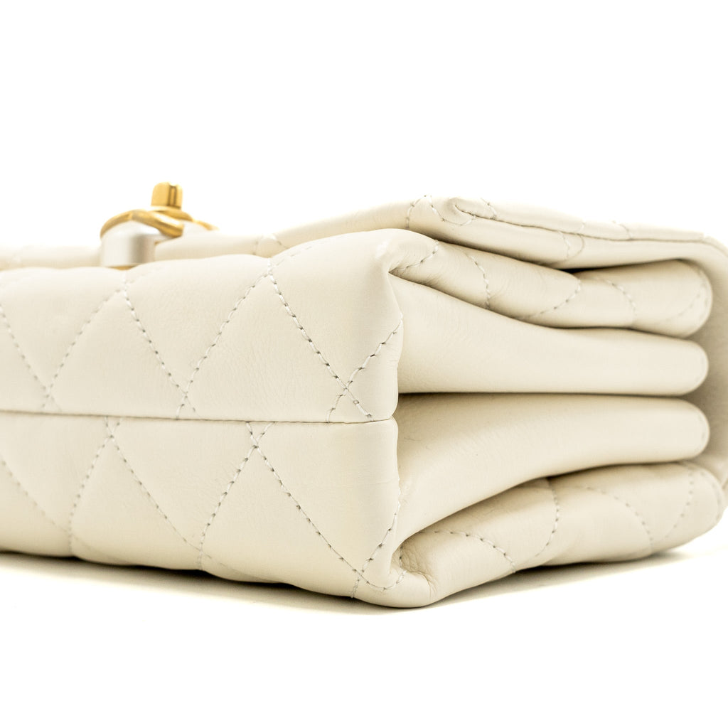 chanel-quilted-mini-flap-bag-lambskin-white-ghw