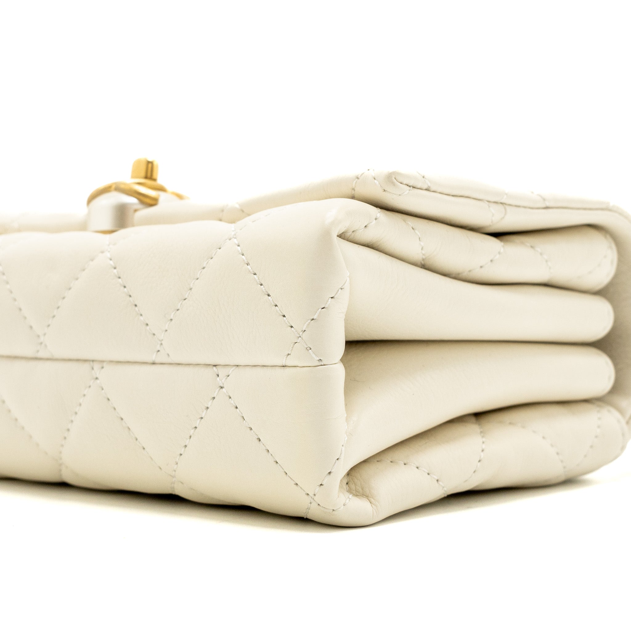chanel-quilted-mini-flap-bag-lambskin-white-ghw