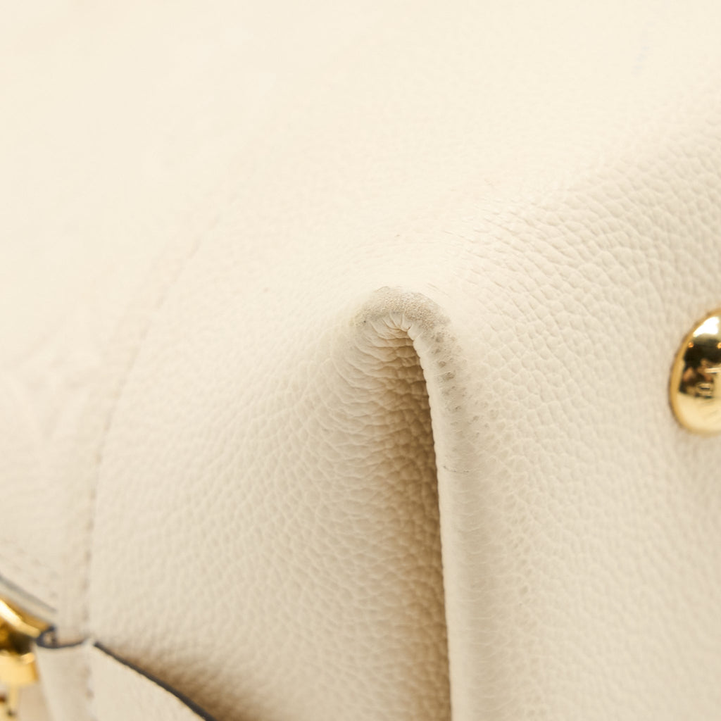 louis-vuitton-neo-alma-pm-monogram-empreinte-white-ghw