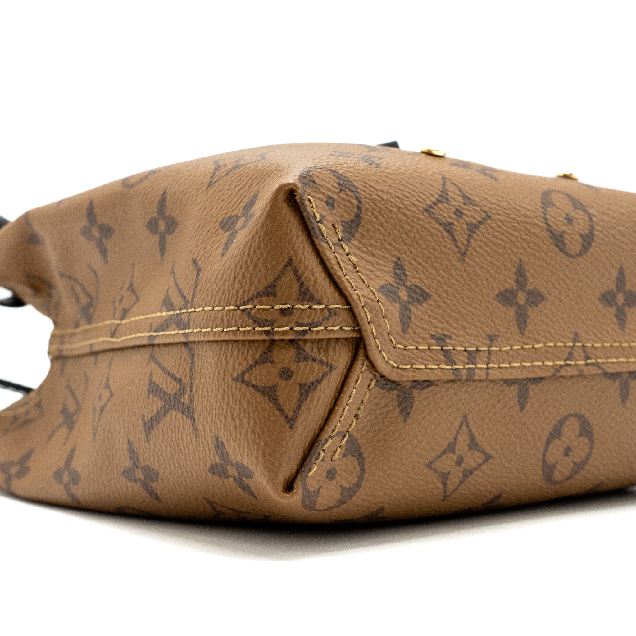 louis-vuitton-atlantis-bb-monogram-reverse-canvas-ghw
