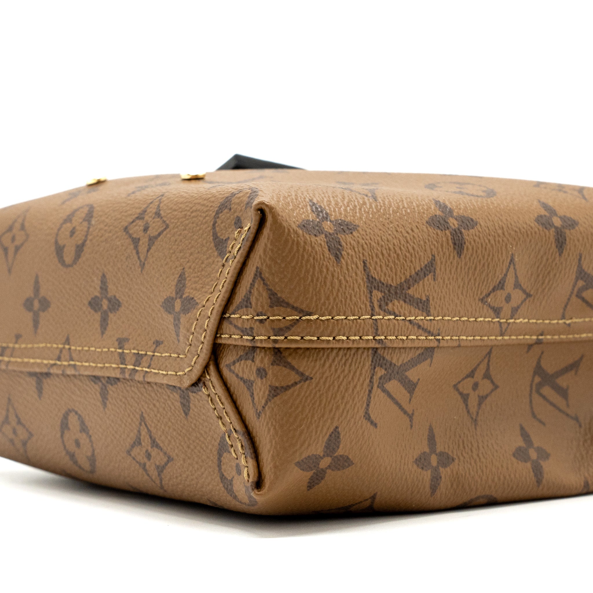 louis-vuitton-atlantis-bb-monogram-reverse-canvas-ghw