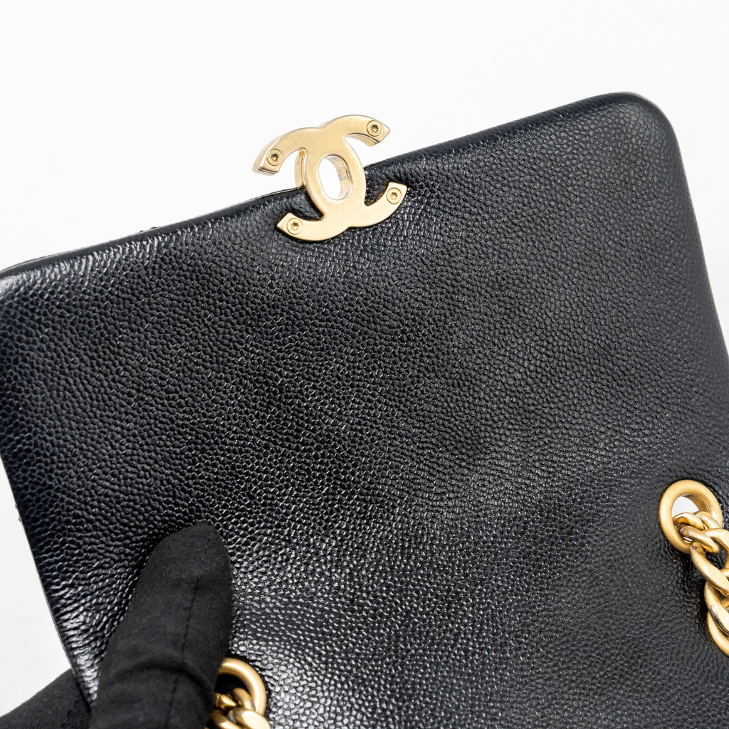 chanel-quilted-flap-backpack-caviar-black-ghw-microchip