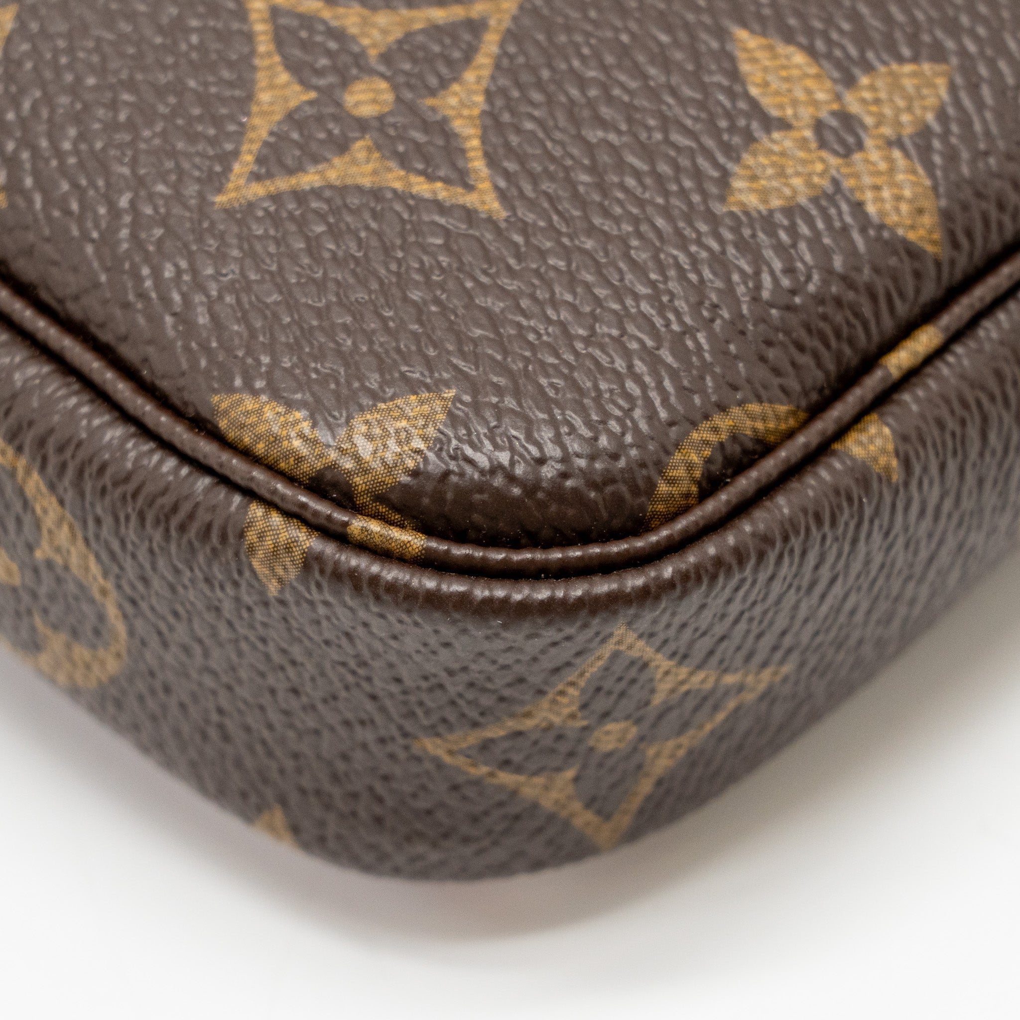 louis-vuitton-2020-mini-pochette-2020-christmas-animation-bumper-cars-monogram-canvas-ghw