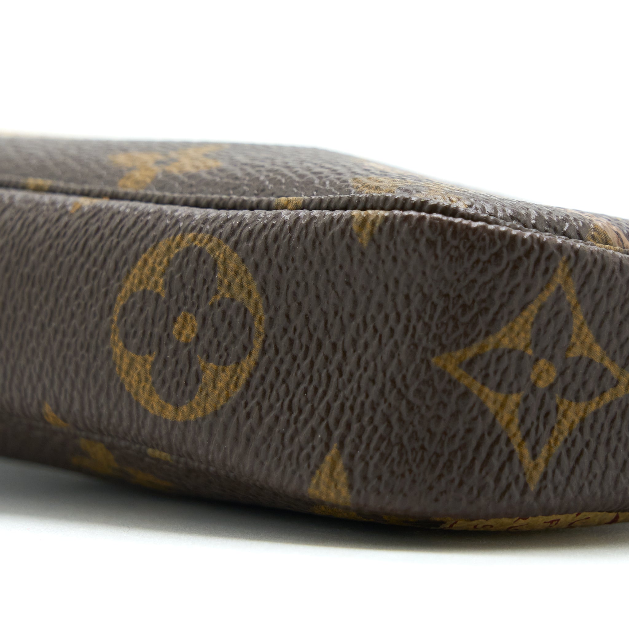 louis-vuitton-mini-pochette-limited-edition-monogram-canvas-ghw-1