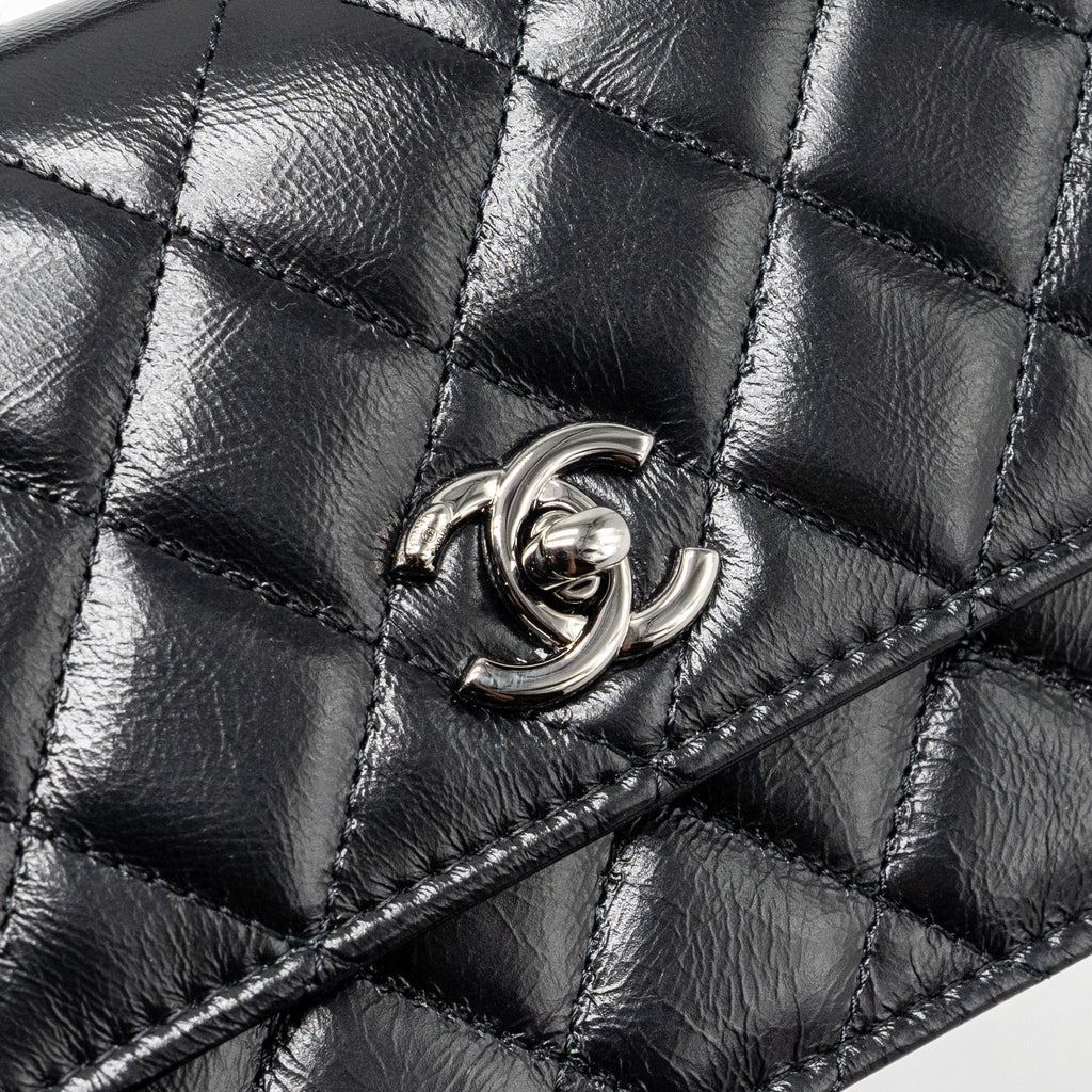 chanel-crystal-top-handle-mini-flap-bag-calfskin-black-with-black-hardware-microchip