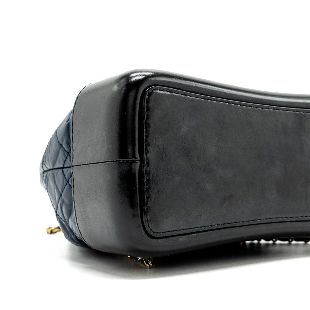 chanel-small-gabrielle-backpack-aged-calfskin-navy-blue-black-ruthenium-hardware