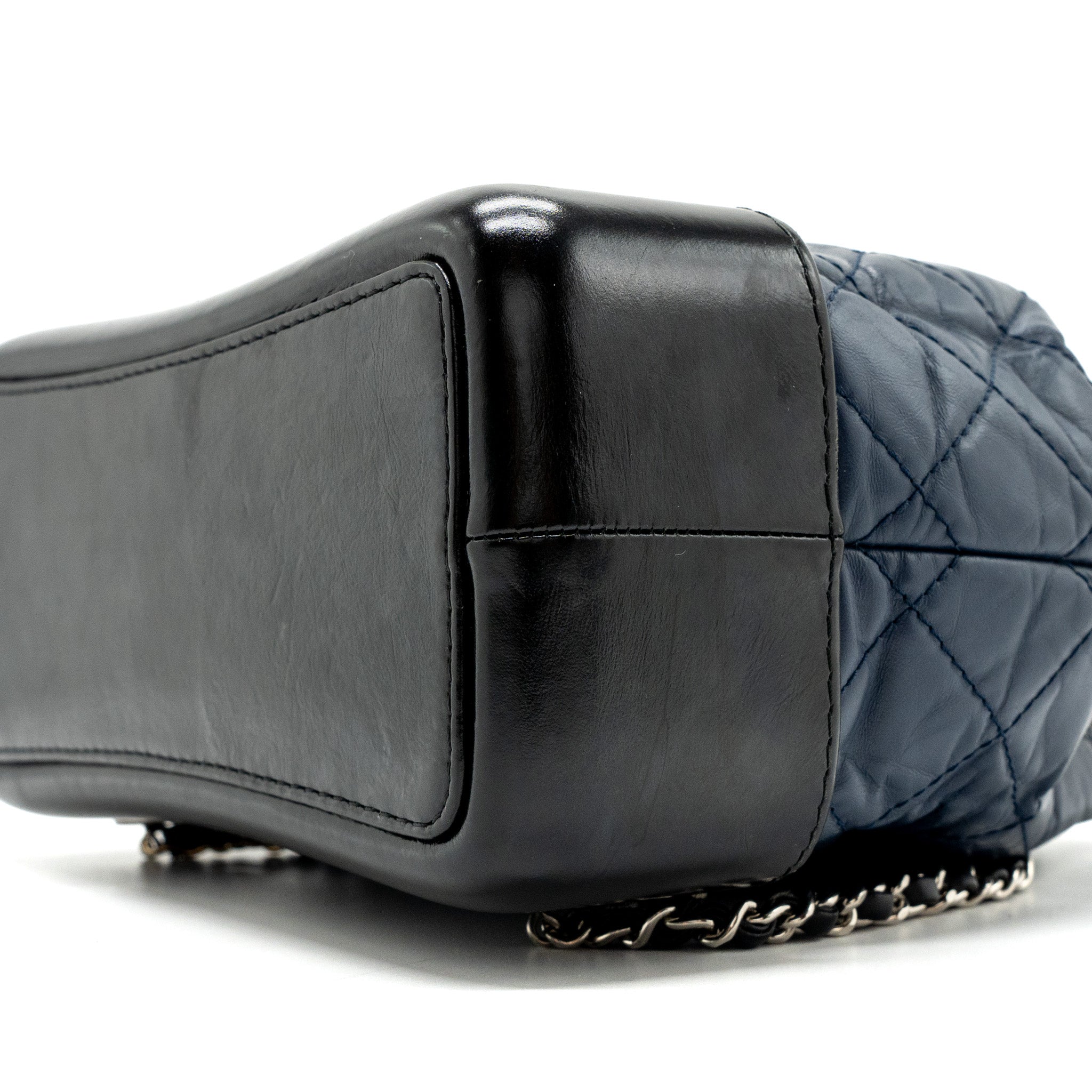 chanel-small-gabrielle-backpack-aged-calfskin-navy-blue-black-ruthenium-hardware