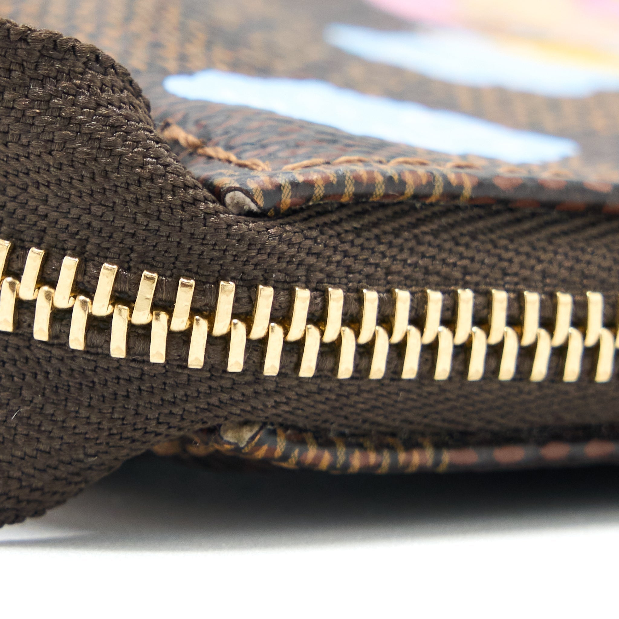 louis-vuitton-mini-pochette-accessories-limited-vivienne-holidays-damier-ebene-canvas-ghw