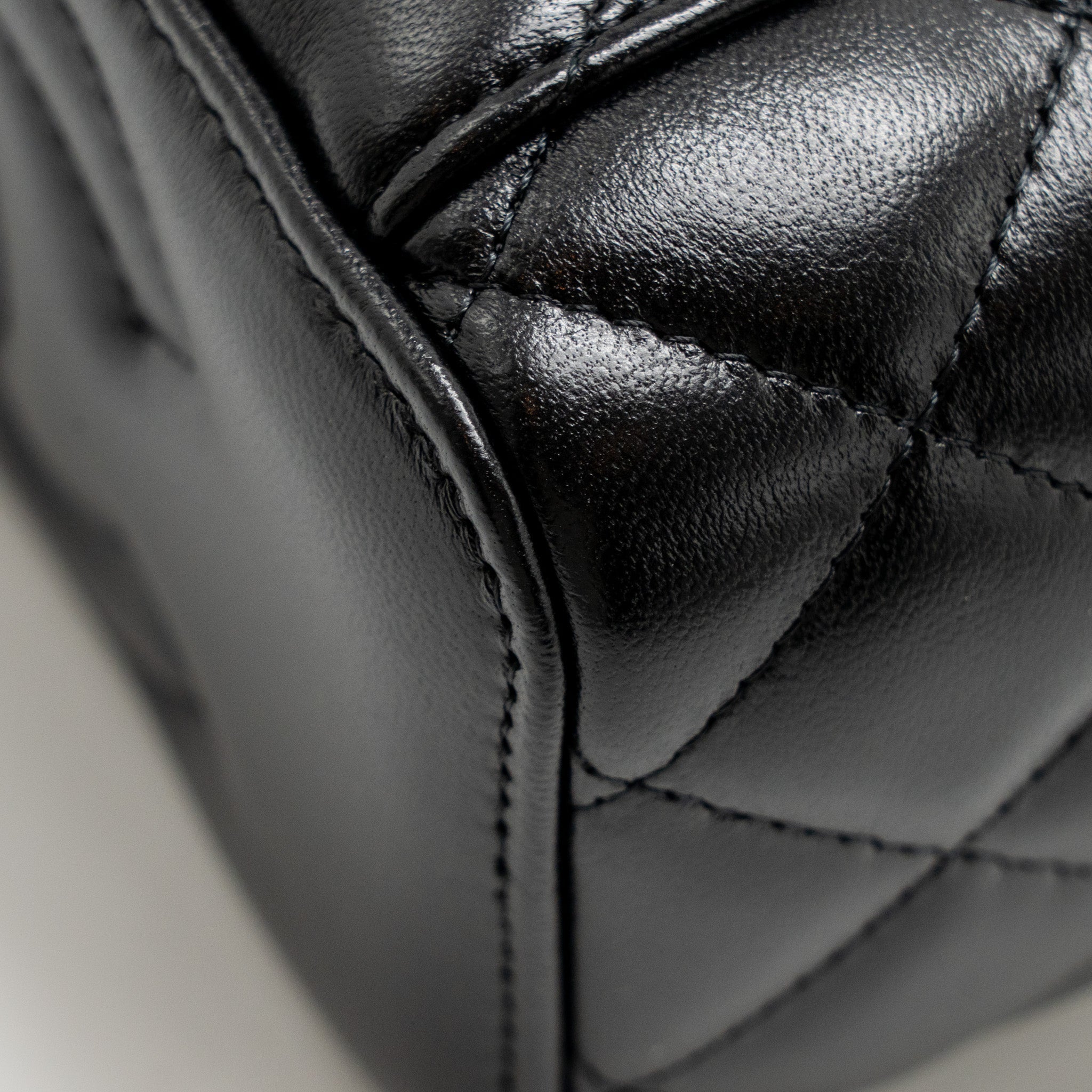 chanel-24a-long-vanity-case-with-cc-logo-adjustable-chain-lambskin-black-ghwmicrochip